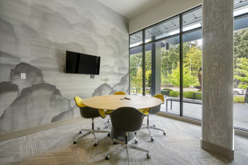 meeting room with TV and large windows